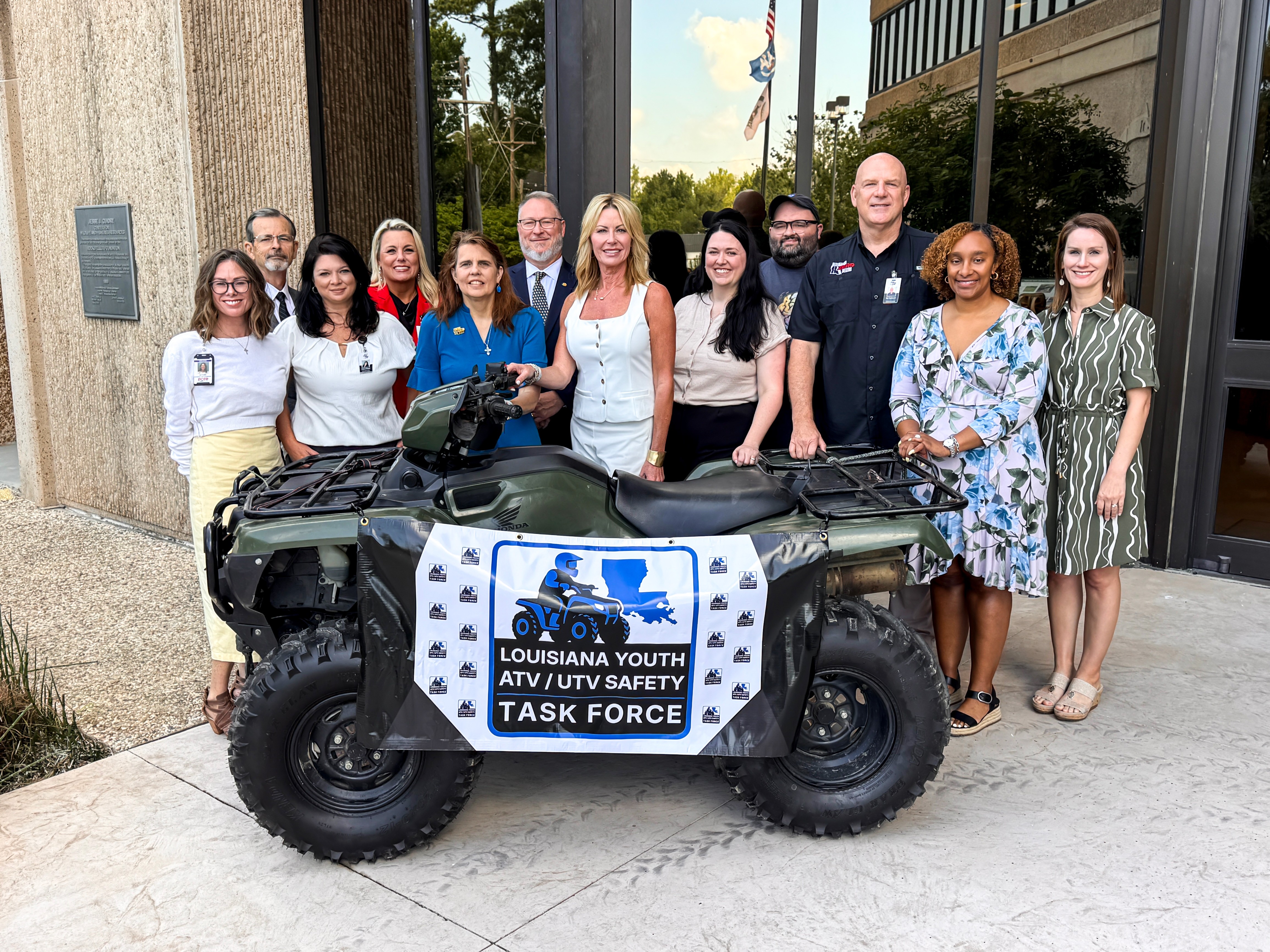 Louisiana Youth ATV/UTV Safety Task Force group photo in front of atv